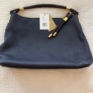Michael Kors Skorpios Shoulder Bag.